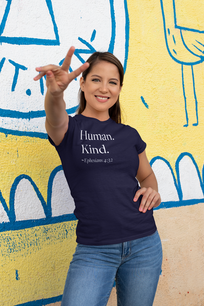 Woman wearing navy blue Human Kind unisex t shirt