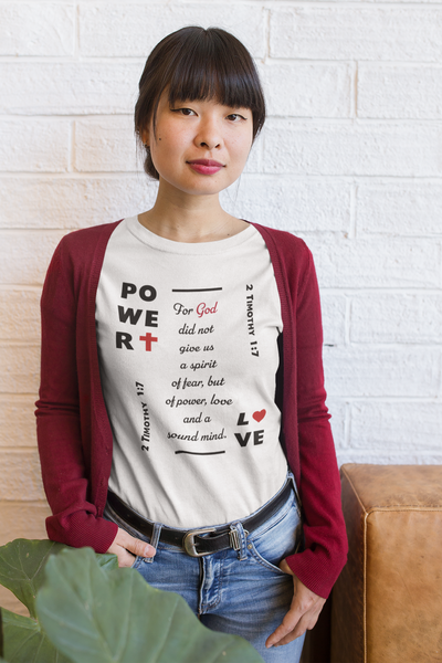 Woman wearing white Power Love Ladies t shirt