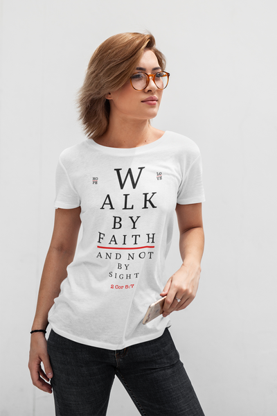 Woman wearing white Walk By Faith Unisex t shirt